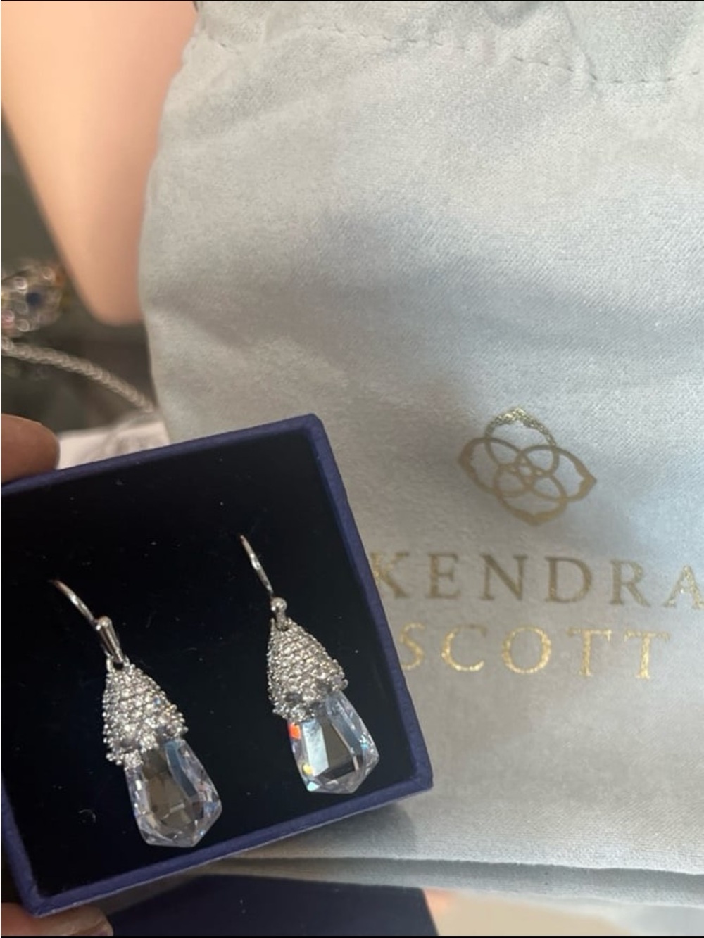 Rayna pendant drop rhodium earrings from kendrascott